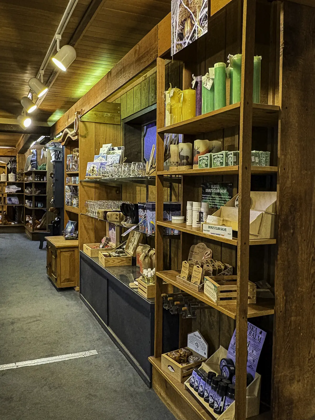 Gift Shop shelves with mugs and travel finds
